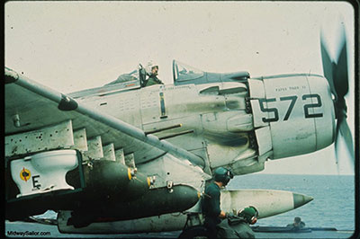 The AD-1H Skyraider with the Toilet Bomb mounted on a pylon on a/c 572