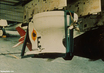 A close-up of the Toilet Bomb mounted on a pylon on a/c 572