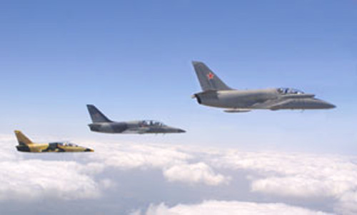 L-39 jet aircraft flying in left-echelon formation