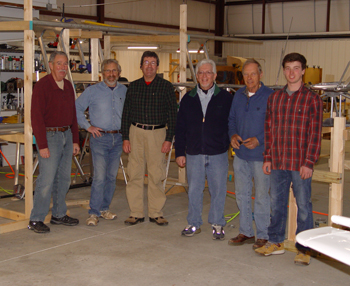The key six volunteers working on the Nieuport 28 construction. From left to right: Jim Hull, Mike Racette, Joe Shea, John Cecilia, Jim Goodman, and Charles Kendall.