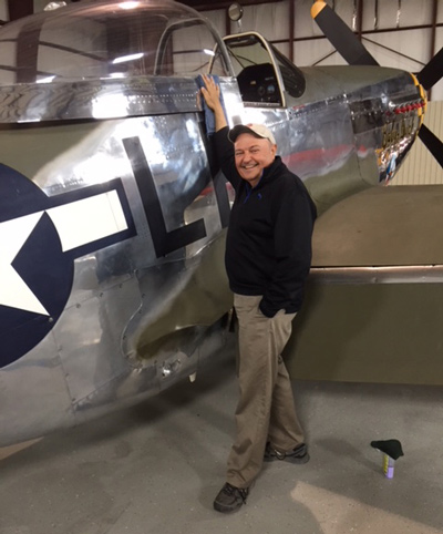 Vlado Lenoch standing next to the P-51 Mustang, Baby Duck